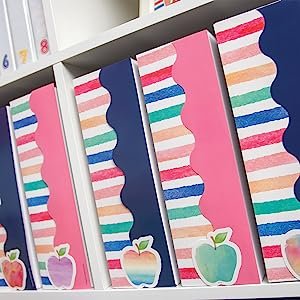 watercolor stripes, navy, and light pink scalloped border trim on storage organizers